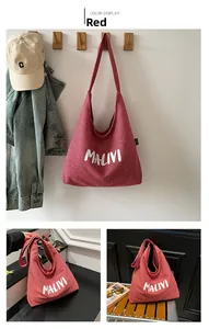 Detailed close-up of red and white gingham canvas tote bag featuring MALIVI letter print