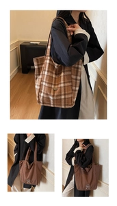 Detail of a reversible brown checkered canvas tote bag with a handmade tag and puppy print