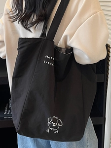 Minimalist black canvas tote bag with Hello Little puppy embroidery for daily casual use