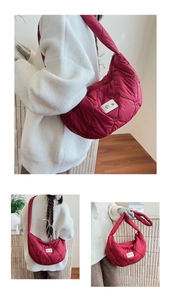 Detail view of the burgundy quilted heart pattern on this soft puffer crossbody bag