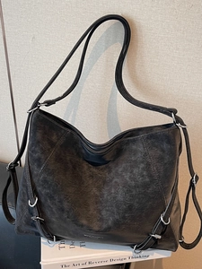 Minimalist black faux suede tote bag with large capacity and vintage metal buckle detail