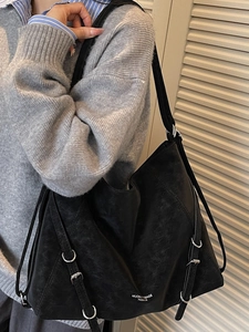 Black suede large capacity tote bag with silver metal buckles for a retro biker style