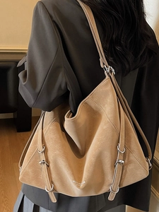 Minimalist camel suede hobo bag with adjustable silver buckle for daily commuting