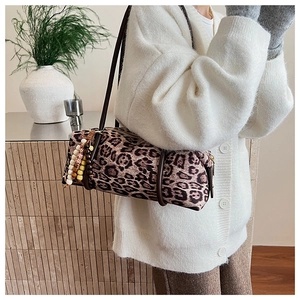 Retro leopard print cylinder shoulder bag with beaded charm and plush texture
