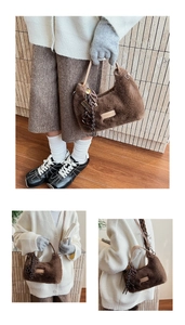Detailed close-up of brown faux fur texture with 'love every day' leather tag on tote