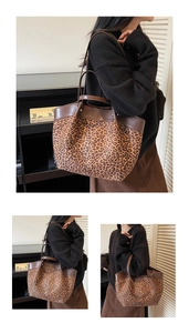 Close-up of leopard print tote bag featuring brown leather trim and large capacity