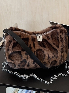 Fashionable leopard print plush shoulder bag with leather strap and silver chain details
