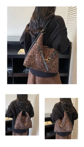 Detailed views of a leopard print shoulder bag with gold hardware and adjustable strap