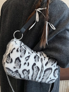 Fashionable leopard print plush shoulder bag with elegant metal chain strap and soft faux fur
