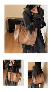 Detail view showing woven texture and slim dual straps of this brown retro tote bag