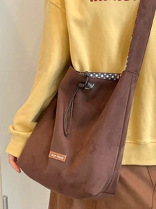 Ethnic denim patchwork tote bag with leopard print and drawstring in vintage brown suede