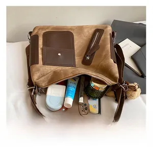 Top view showing the large internal capacity of the brown tote bag for daily essentials