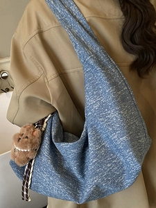 Large vintage shoulder tote bag in blue texture with cute brown bear charm detail