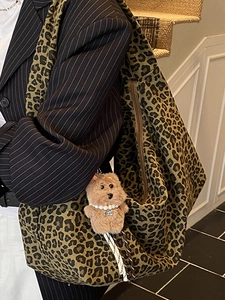 Large leopard print tote bag in olive green canvas with cute teddy bear charm