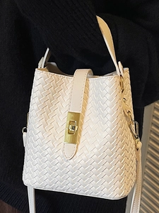 Chic white woven bucket bag with gold metal lock and shoulder strap for women