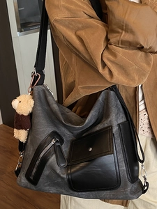 Vintage gray canvas tote bag with leather details and bear pendant for women travel
