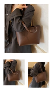 Detailed view of the brown lychee pattern leather tote bag with elegant metal logo