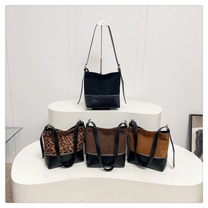 Detailed collection of versatile suede bucket bags in black, leopard, brown, and tan hues
