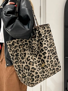 Large leopard print canvas tote bag for women showing a stylish casual commuter shoulder style