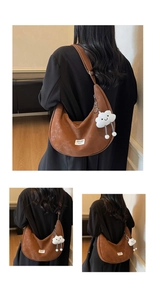 Brown faux leather hobo shoulder bag with a cute white plush cloud charm accessory