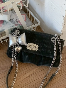 Y2K style black velvet chain bag with silver butterfly charm and metallic buckle