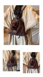 Detailed view of dark brown tote bag featuring leather logo patch and star plush charm