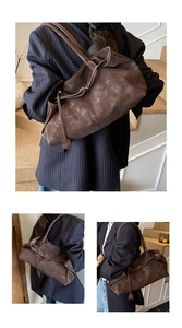 Detail view showing textured vintage oil wax leather and drawstring on large tote bag