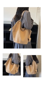 Detailed view of apricot faux suede tote bag with drawstring side and stylish pendant