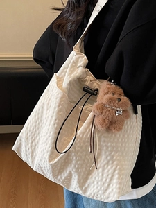 Chic cream white waffle texture canvas tote bag with drawstring closure and cute bear charm