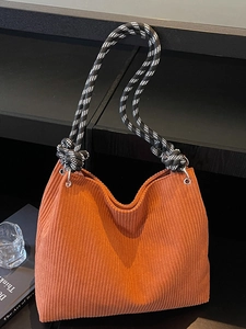 Orange corduroy tote bag with black and white checkered wide rope handle for women