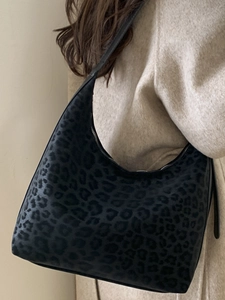 Vintage leopard print tote bag in black flocking material with a stylish shoulder strap