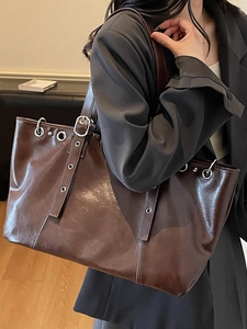 Retro deep brown large leather tote bag with silver eyelets and side buckle for daily commute
