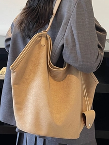Minimalist large camel suede tote bag for women showing crossbody fit and large capacity