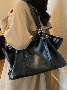 Retro black high-gloss tote bag with metal eyelets and adjustable strap for women