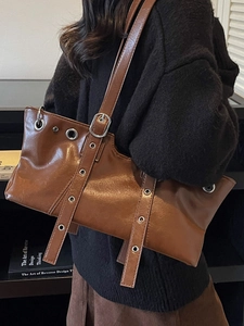 Vintage brown large capacity shoulder bag in glossy faux leather with metal eyelets