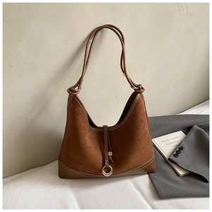 Brown frosted leather hobo bag with metal ring detail and dual shoulder straps