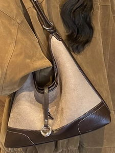 Minimalist oatmeal suede and brown leather hobo shoulder bag with metal ring detail