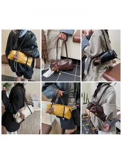 Detail view showing stylish leather pillow shoulder bags with heart and tassel charms