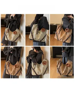 Detail shots of a large retro canvas tote bag with decorative charms and leather accents