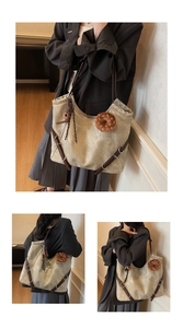 Detail of vintage beige tote bag with brown leather accents and plush donut charm