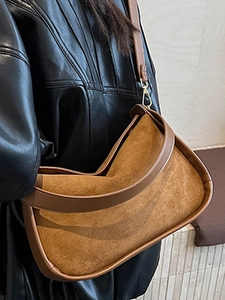 Vintage brown suede hobo bag with adjustable strap and gold metal hardware for women