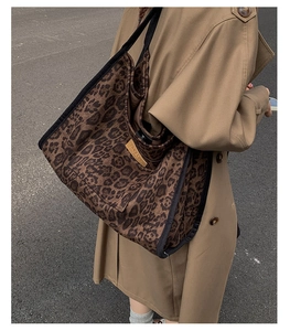 Leopard print suede tote bag with black webbing trim and HOPEFUL leather logo patch