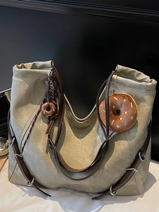 Retro high-capacity tote bag in grey faux suede with brown handles and donut charms