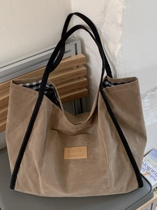 Large capacity khaki faux suede tote bag with black straps and classic checkered lining