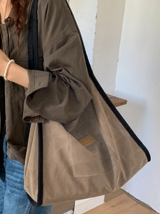 2025 casual khaki suede large capacity tote bag with black trim and shoulder straps