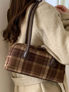 Vintage brown plaid bowling handbag in wool fabric with leather handles and zip closure