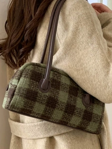 Green and brown checkered woolen shoulder bag with leather handle for autumn