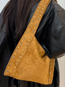 Retro brown suede shoulder bag with gold rivets and studs for high-end fashion styling