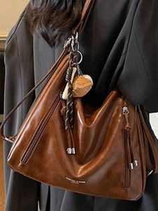 Retro brown oil wax leather tote bag with strawberry charm and double side zippers