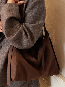 Brown frosted leather hobo bag with wide strap for women in a vintage autumn style
